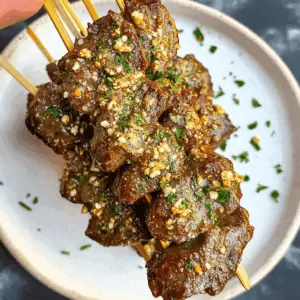 Spice up your dinner with these Cajun Garlic Parmesan Air Fryer Steak Skewers! Tender pieces of steak are coated in a zesty Cajun seasoning, tossed with garlic, and finished with a sprinkle of Parmesan. Perfect for a quick weeknight meal or a weekend gathering. Don’t forget to save this recipe for a flavorful grill night!